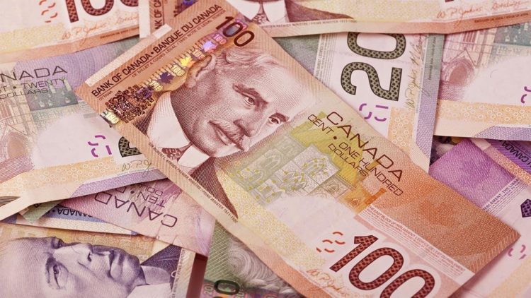 Dolar Kanada dan Dolar AS Turun Setelah BoC dan Fed Memotong Suku Bunga